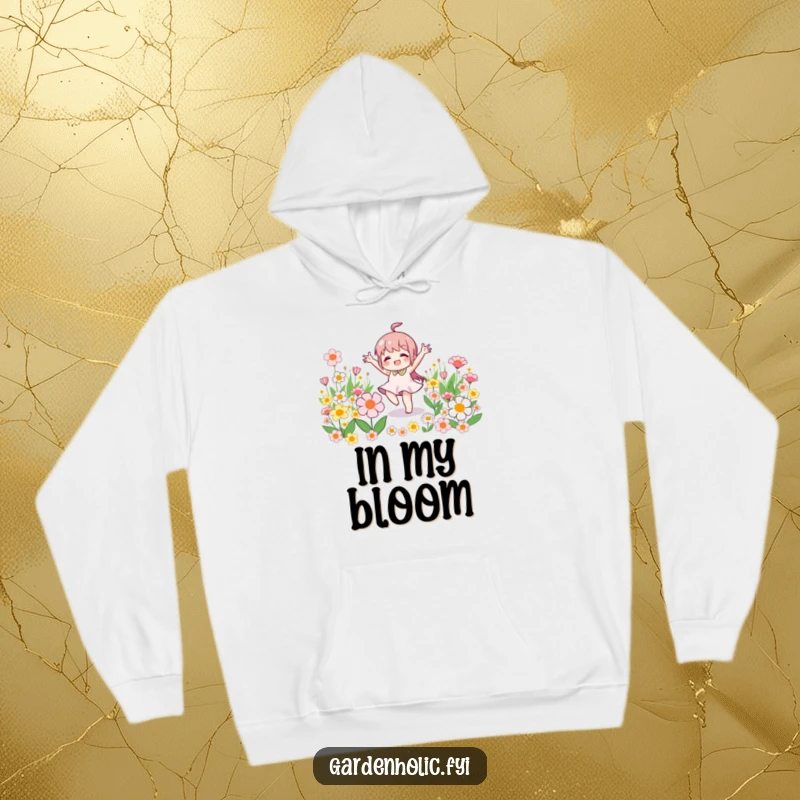 Funny hoodie featuring a little character joyfully doing a victory dance amidst blooming flowers, perfect for cozy celebrations.