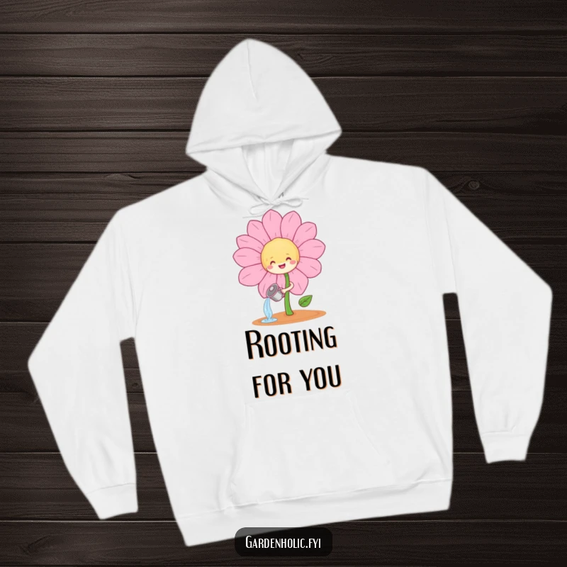 Funny sprouting plant character watering a large, happy flower on a warm hoodie, a delightful and funny gift.